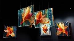 abstract acrylic installations, captivating, hanging from the ceiling, photorealistic, in a dimly lit exhibition space, highly detailed, dynamic shadows and highlights, 70-200mm lens, contrasting colors, spotlight lighting, shot with a 35mm prime lens